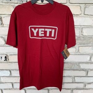 Yeti red shirt with logo on front